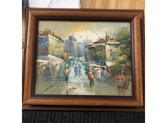 Framed Painting Of City Scene With Mountain In Background