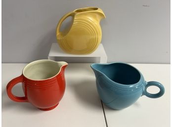 Trio Of Things That Pour - Hall's Pottery Red Pitcher, Yellow & Blue Fiesta Ware Pitchers