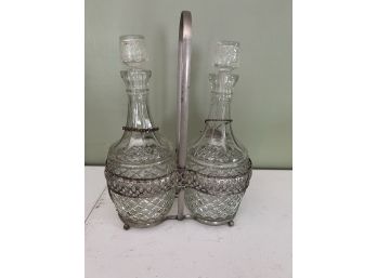 LR/ Pair Of Pretty Pressed Glass Decanters W/tops In A Double Silver Plate Holder