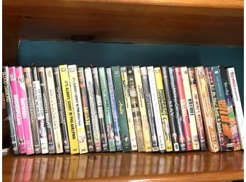 LR/ Shelf Of 32 Assorted Movie & Series DVDs