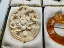 Lot 31- Brooch Collection In Box - Russian Painted 1968 Dragon Pendant Bakelite? Signed Face Pin