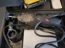 Lot 184 - Lot Of Four Power Tools Belt Sander, Skill Saw, Rotary ZIP Cutter, Palm Sander