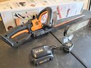Lot 301 - Yard Power Tools X 2 Echo Chainsaw & Worx Battery Op Hedge Trimmer
