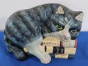 Lot 210- Cast Iron Painted Resting Cat On Books Door Stop - Heavy