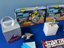 Lot 116- Star Trek Lot New Tricorder Phaser Fighter Statue Paperweight