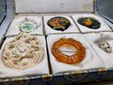 Lot 31- Brooch Collection In Box - Russian Painted 1968 Dragon Pendant Bakelite? Signed Face Pin