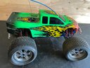 Lot 265 - RC Remote Control Bright Green Monster Truck With Fire Decals