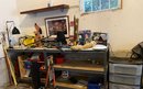Lot 288 - HUGE Workbench Lot -  Tools, Fan, Lamps, Knobs, Vintage Red Ryder Gun, Beatles, Metal Shelves
