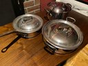 Lot 330 - Chef Set Of 3 Made In France Stainless Heavy Gauge Cast Iron Handle Pans