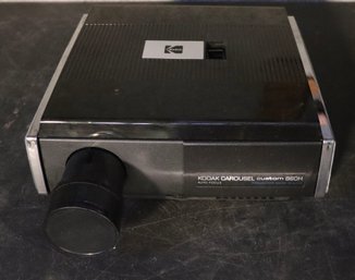 Lot 134-  Vintage Kodak Carousel Custom 860H Projector Set In Case