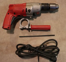 Lot 137- Milwaukee Corded Magnum 1/2' Hammer Drill  Model 5730