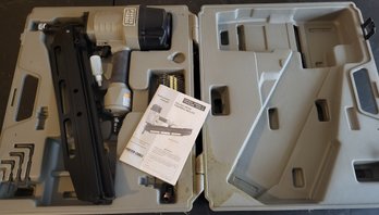 Lot 185 - Porter Cable Compressed Air Framing Gun W/Case Like New