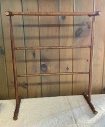 Lot 100- Antique Wood Quilt Rack