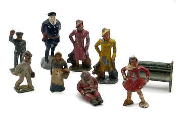 Lot 28- Antique Metal Toy People Collection Of 9 Santa Woman Man Police Bench