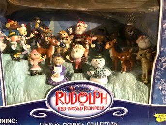 Lot 285- New And Sealed Rudolph Reindeer Holiday Figurine Collection
