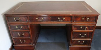 Lot 129-  Vintage Mahogany English Style Chesterfield Executive Desk With Leather Inlaid Top