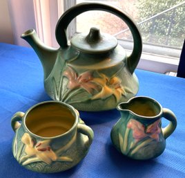Lot 36- Roseville USA Tea Pot & Creamer And Sugar Set - As Is