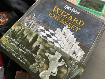 Lot 282- Harry Potter Lot - NEW Photo Books Kids Robe New Wizard Chess Set - New Puzzle