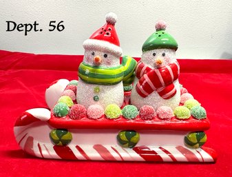 Lot 325SES - Department 56 Salt And Pepper Snowman On Sleigh With Gumdrops