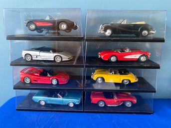 Lot 75 - Revell Inc Durango Maisto Collection Of 8 Cars In Plastic Cases - Porche, BMW, Corvette, Mustang 1/18