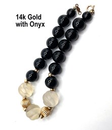 Lot 11 - 14K Gold & Black Onyx 7 Inch Bracelet