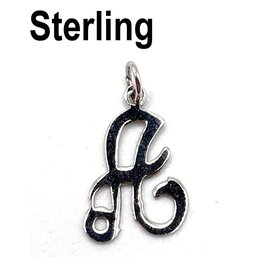 Lot 24 - Sterling Silver Letter 'a' Charm