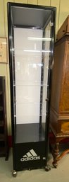 Lot 72 - WOW! ADIDAS Black Metal Lighted Cube Cabinet With Acrylic Sides & Shelves On Casters