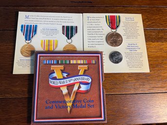 Lot 131- World War II 50th Anniversary Coin And Victory Medal Set