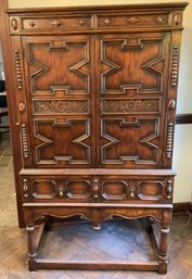 Lot 8- 1920s Kensington Furniture Carved Oak Cabinet With Key