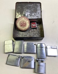 Lot 217 - Vintage Lighters And Old Ford Emergency Kit Tin Box