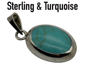 Lot 130- Sterling Silver & Turquoise Oval Pendant