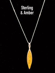 Lot 157- Sterling Silver Mexico Chain With Amber Pendant