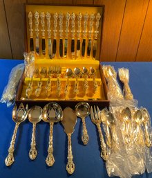 Lot 174- Stanley Roberts Alexis Gold Stainless Flatware Silverware Set - 105 Pieces