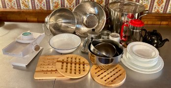 Lot 53- Kitchen Lot - Big Pot, Strainers, Corelle, Tea Pot, Trivets, Slicer - 27 Pieces