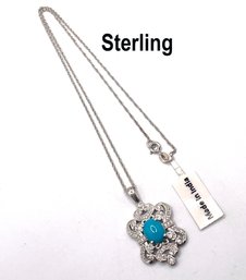 Lot 54 - Sterling Silver Chain With Pendant - Signed STS