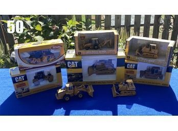 Lot 50 - Lot Of 8 CAT Die Cast Metal John Deere - New In Box Tractors