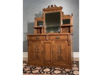 Late 19th C. Victorian Carved Oak Buffet With Mirrored Back