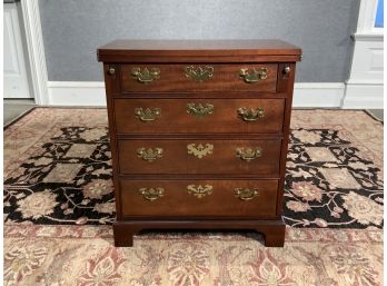 Baker Furniture Co. Mahogany Four Drawer Bachelors Chest With Fold Out Top