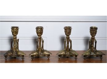 Set Of Four 'Mottahedeh Design' Brass Candlesticks