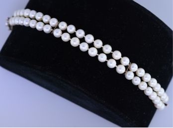 Double Strand Pearl And Gold Bracelet