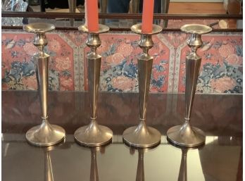 Four Sterling Candlesticks (cTF10)