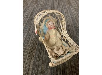 Bisque Head Baby Doll In Wicker Rocking Bassinet (CTF10)