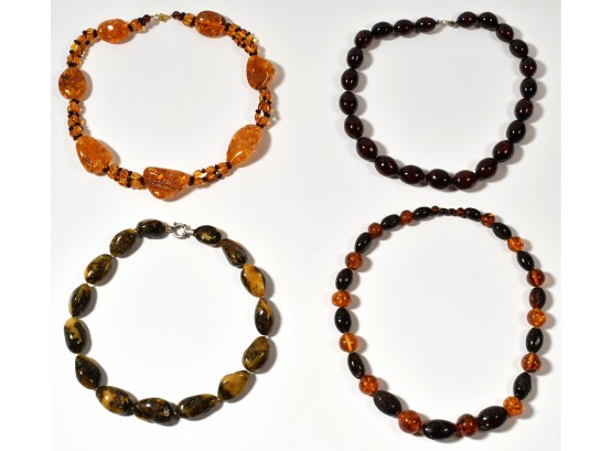 Four Large Amber Bead Necklaces (CTF10)