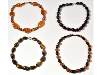 Four Large Amber Bead Necklaces (CTF10)