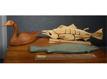 Two Carved Modern Wooden Fish Sculptures And A Carved Wood Decoy