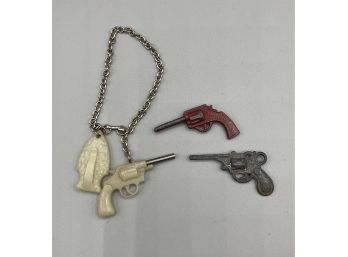 Vintage Miniature Cast Metal Handgun Charms And Bracelet W Plastic Arrowhead And Gun