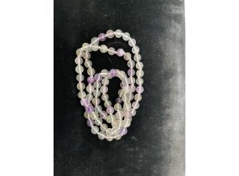 Old Jade Or Quartz Or Amethyst Beads Or Knotted String
