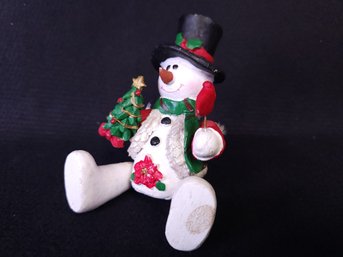 Sitting Snowman With Swivel Legs And Holding A Christmas Tree And Cardinal