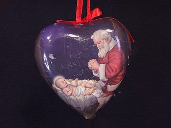 Santa Claus Praying Over Baby Infant Jesus Christ Heart Shaped Paper Wrapped Glass Ornament