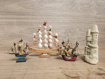 4 Piece Lot Of Miniature Ships Including Nina & Pinta A Souvenite From Galvesten Island Pressed Sand Castle